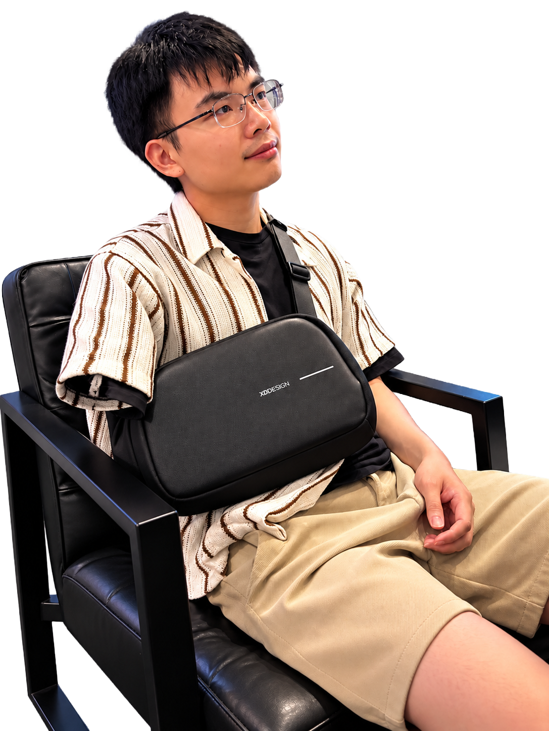 Jimmy Hoe seated and raising a blue drink